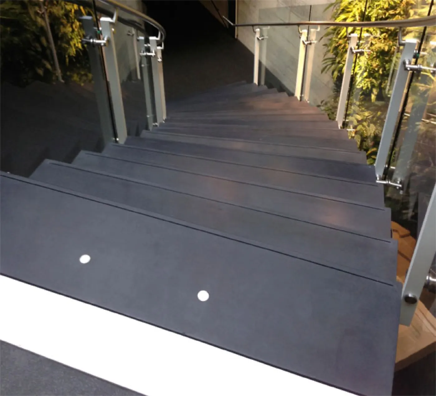 Close view of a black Ductal tread edge, the nosing crisp and the surface uninterrupted