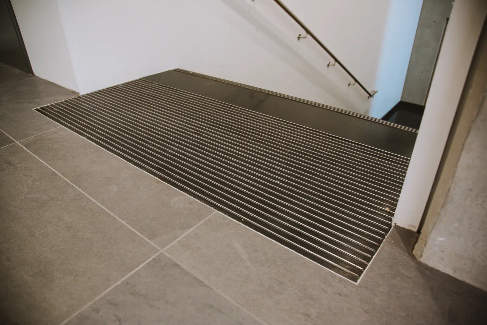 Detail of ribbed UHPC stair treads at the University of Victoria, thin sections carrying full structural load